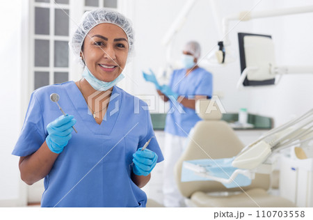 Portrait of dentist female in workplace in clinic Portrait of dentist female in workplace in clinic 110703558