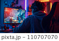 Modern Gaming Lifestyle Captured: Teen in Neon Glow During Intense Gaming 110707070