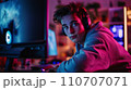 Modern Gaming Lifestyle Captured: Teen in Neon Glow During Intense Gaming 110707071
