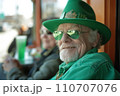 Joyful Elderly Celebrating St. Patrick's Day in Vibrant Green, Urban Outdoor Bar Scene 110707076