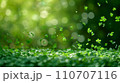 St. Patrick's Day Celebration with Clover Confetti and Soft Green Bokeh Lights 110707116