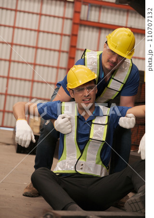 Engineer help anoter engineer, He has accident on the work in factory. Engineer help anoter engineer, He has accident on the work in factory. 110707132