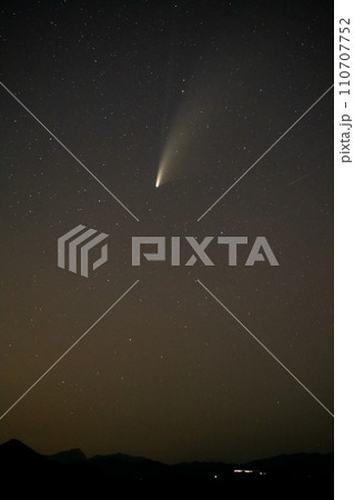 NEOWISE Comet above lake low above horizon 110707752