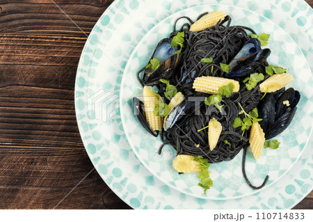 Mussels and black pasta. Mussels and black pasta. 110714833
