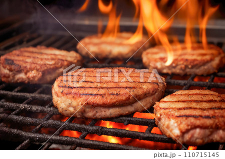 Juicy beef hamburger patties on barbecue grill. Barbecue Grill Pit With Glowing And Flaming Hot Charcoal 110715145