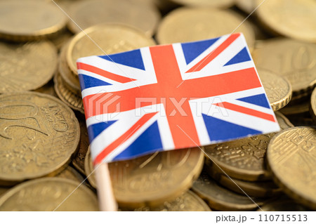 United Kingdom flag on coins money, finance and accounting, banking concept. 110715513