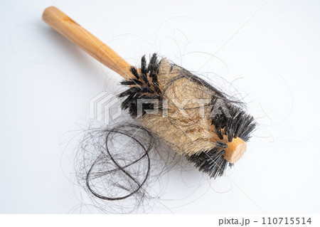 Hair loss fall with comb bush serious problem health, beauty and cosmetic concept. Hair loss fall with comb bush serious problem health, beauty and cosmetic concept. 110715514