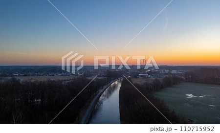 Dawn's Embrace: Frosty Canal by the Awakening Town 110715952