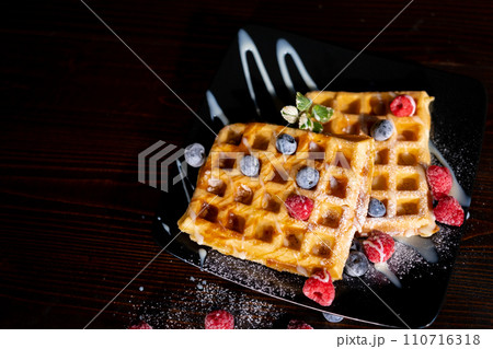 Belgian Liege waffles with berries, blueberries athens raspberries blueberries 110716318