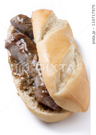 Traditional choripan, Argentina sandwich with chorizo and chimichurri sauce. isolated on white background	 110717970