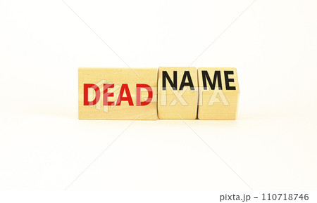 Deadname or name symbol. Concept words Deadname or Name on beautiful wooden blocks. Beautiful white table white background. Business, deadname or name concept. Copy space. Deadname or name symbol. Concept words Deadname or Name on beautiful wooden blocks. Beautiful white table white background. Business, deadname or name concept. Copy space. 110718746