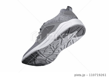 Sport shoes. Gray sneaker made of fabric with leather accents. Sport shoes. Gray sneaker made of fabric with leather accents. 110719261