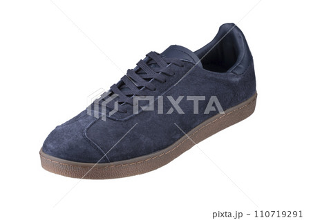 Suede sneaker on a white background. Men's sports shoes. 110719291