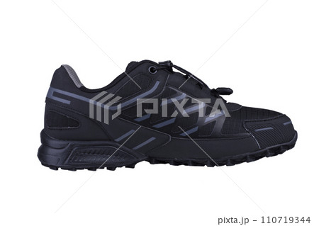 Black sneaker on a white background. Winter sneakers. Black sneaker on a white background. Winter sneakers. 110719344
