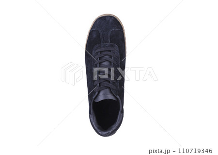 One black sneaker on a white background top view. One black sneaker on a white background top view. 110719346