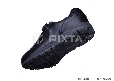 One black sneaker on a white background. Sport shoes. 110719359