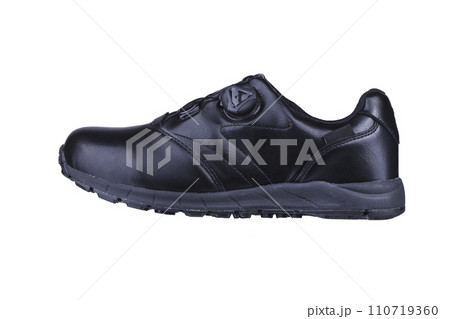 One black sneaker on a white background. Sport shoes. 110719360