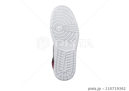 White sole of shoes. Bottom of sneakers on a white background is insulated. 110719362