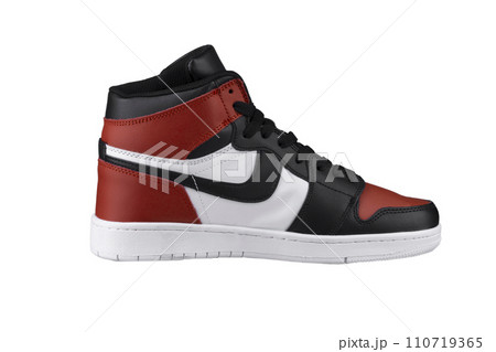 Side view of a high sneaker with red and black accents. Side view of a high sneaker with red and black accents. 110719365
