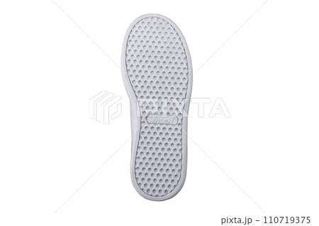 White sole of shoes. Bottom of sneakers on a white background is insulated. White sole of shoes. Bottom of sneakers on a white background is insulated. 110719375