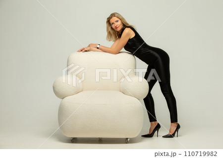 A plastic bucket with grated carrots 110719982