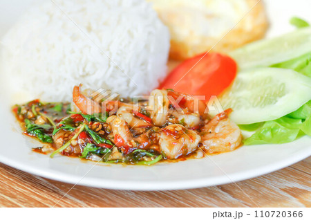 stir fried shrimp with holy basil and sunny side up egg or fried egg 110720366