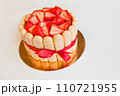 tiramisu cake with strawberries, ladyfingers, mascarpone and red bow-tape isolated on white 110721955
