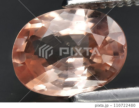 natural orange zircon gem on the background natural orange zircon gem on the background 110722480