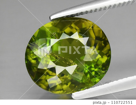 natural green tourmaline gem on the background 110722551