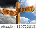 Two Wooden Directional Signs with Text Right and Wrong 110722813