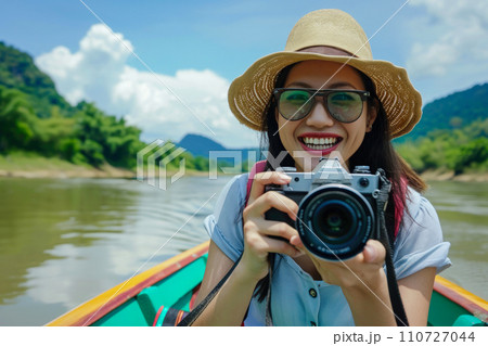 Joyful Lady Capturing Memories on Thai Water Taxi Joyful Lady Capturing Memories on Thai Water Taxi 110727044