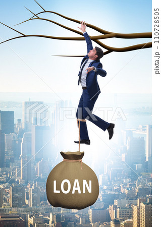Businessman hanging on tree branch 110728505