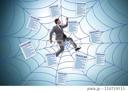 Businessman caught in the web of deadlines Businessman caught in the web of deadlines 110729513