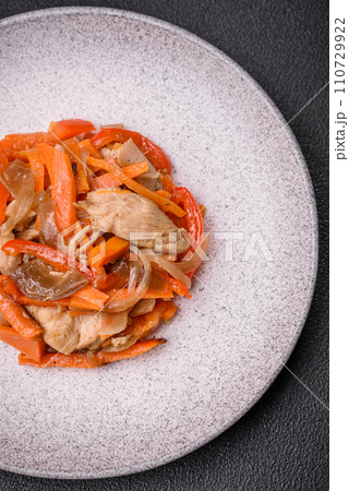 Delicious fresh stew with chicken or turkey with slices of sweet pepper and carrots 110729922