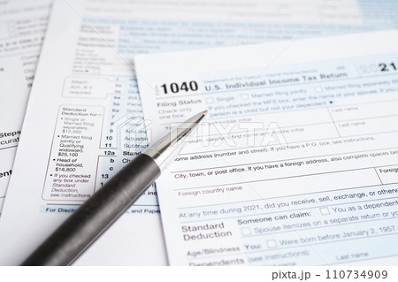 Tax form 1040 U.S. Individual Income Tax Return, business finance concept. 110734909