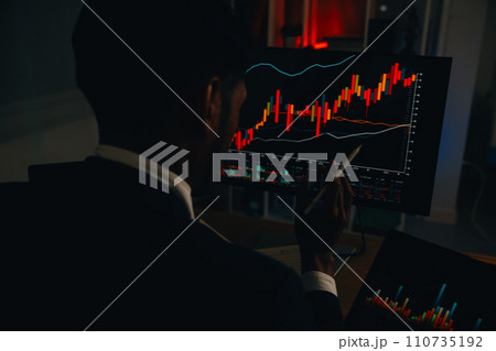 Thoughtful focused successful caucasian male stock investor, broker, financial adviser, sits at work desk, looks at computer, pensively analyze risks and prospects, rise or fall of cryptocurrency coin 110735192