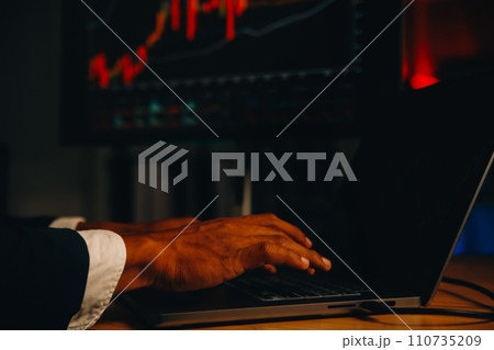 Thoughtful focused successful caucasian male stock investor, broker, financial adviser, sits at work desk, looks at computer, pensively analyze risks and prospects, rise or fall of cryptocurrency coin 110735209