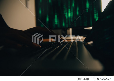 Hacker code in laptop. Cyber security, privacy or hack threat. Coder or programmer writing virus software, malware, internet attack or developing digital design. Green web data in computer screen. 110735237