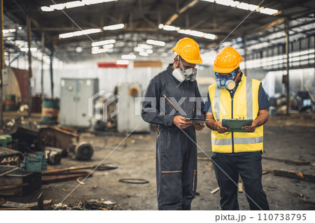 Toxic chemical gas leak safety team working cleaning in danger factory workshop environment contamination safety and protection 110738795