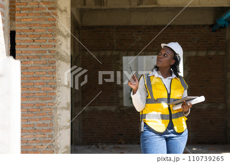 African black women worker work in construction site for site inspector job checking project progress African black women worker work in construction site for site inspector job checking project progress 110739265