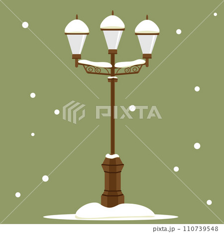 雪の降る夜の街灯 110739548