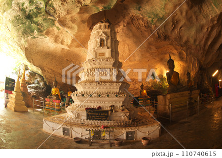 The Pagoda and golden Buddha at Wat Tham Suwan Khuha or Golden cave. This is a popular place for both Thai and foreign tourists. Located at Phang Nga Province in Thailand. The Pagoda and golden Buddha at Wat Tham Suwan Khuha or Golden cave. This is a popular place for both Thai and foreign tourists. Located at Phang Nga Province in Thailand. 110740615