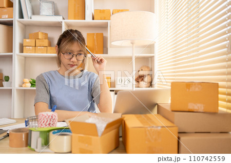 Thinking, Woman is thinking of ideas for selling products online, Finding the path to success, Strategizing for Online Business Success, Sell products online, Looking for new ideas? 110742559