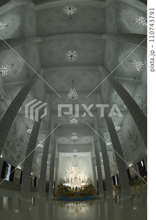 A main white Buddha sits in the Buddhism thai Church. It a beautiful Buddha at Wat Huay Pla Kang temple in Chiang Rai Province in Thailand. 110743791