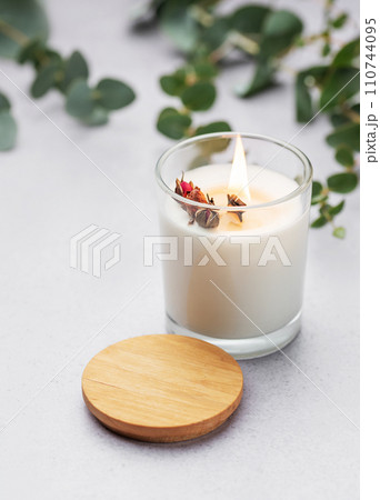 Aromatic candle on the table. Aromatic candle on the table. 110744095