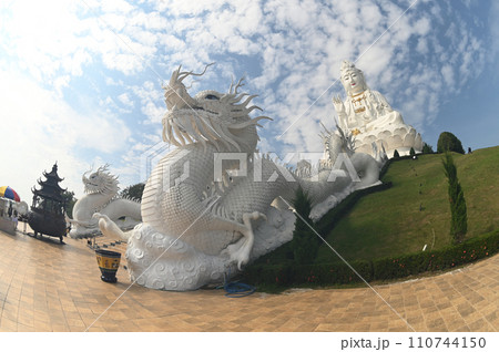 The staircase with white dragon to Guan Yin Bodhisattva Statue the largest in Thailand. It has a height of approximately 79 meters. AT Wat Huay Pla Kang temple. The staircase with white dragon to Guan Yin Bodhisattva Statue the largest in Thailand. It has a height of approximately 79 meters. AT Wat Huay Pla Kang temple. 110744150