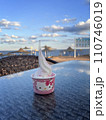 ice cream in pink cup on the table with sea view on background 110746019