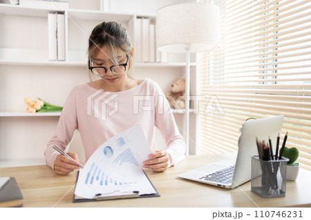 Taking note, Young woman's Hand Writing an Important Message in Notebook - Communication, Take notes of important messages. 110746231