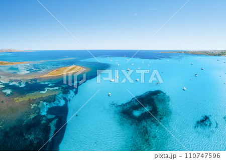 Drone view of a sailing yacht. Luxury transportation. Vacationing people. Vacation and holidays. 110747596