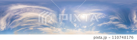 Blue summer sky panorama with light Cirrus clouds. HDR 360 seamless spherical panorama. Full zenith or sky dome for 3D visualization, sky replacement for aerial drone panoramas. Blue summer sky panorama with light Cirrus clouds. HDR 360 seamless spherical panorama. Full zenith or sky dome for 3D visualization, sky replacement for aerial drone panoramas. 110748176